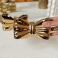 Elegant Bow Shaped Ceramic Organizer with Gold Finish